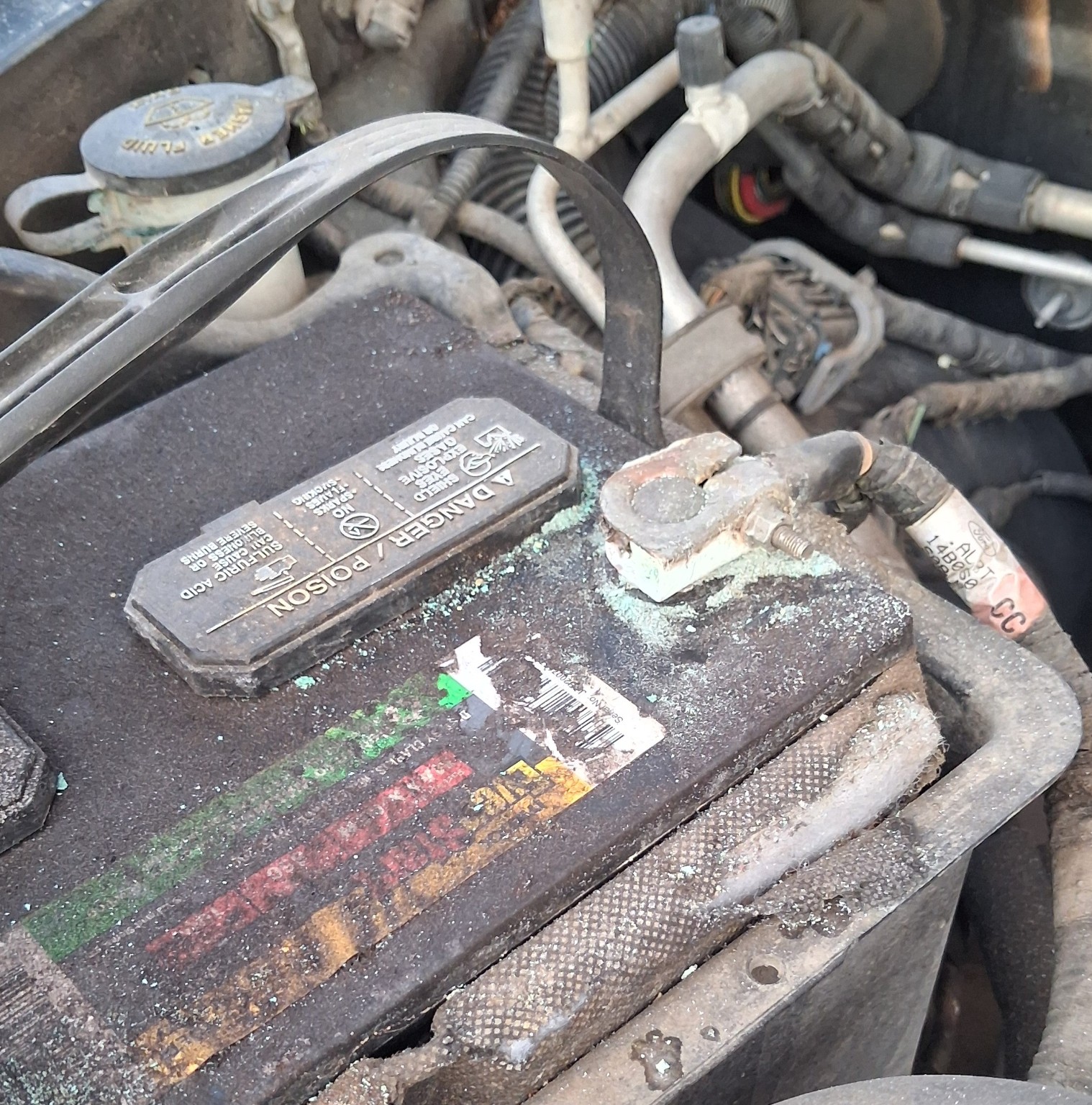 Heavy corrosion on a vehicle battery terminal